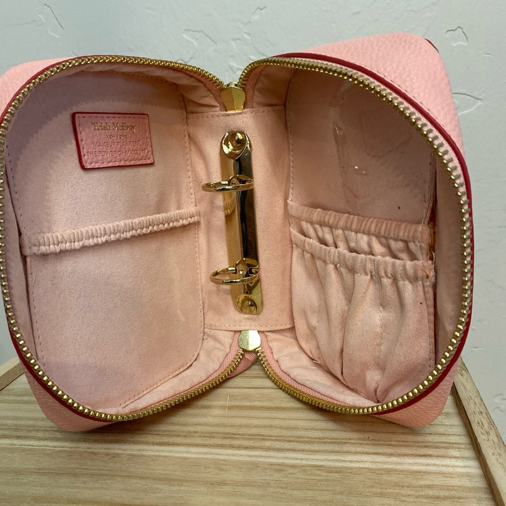 Trish McEvoy pink faux pebbled leather with red trim and heart makeup planner